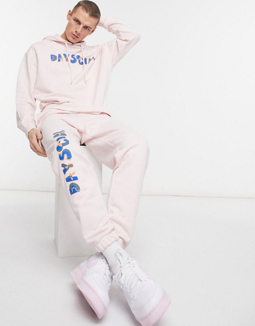ASOS Daysocial co-ord tapered joggers with logo print  in light pink