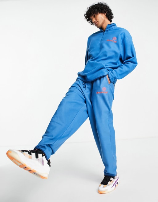 ASOS Daysocial co-ord polar fleece with back graphic print in blue