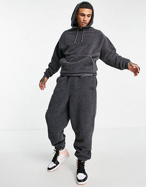 ASOS DESIGN co-ord oversized joggers in teddy borg with badge