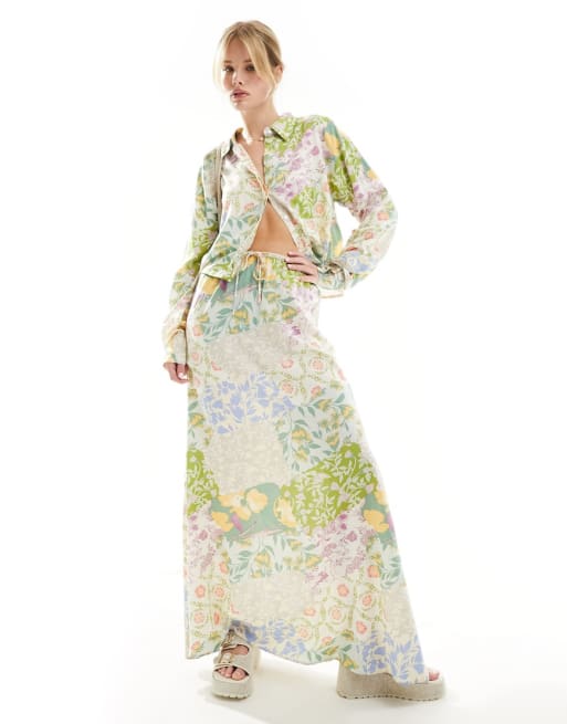 ASOS DESIGN - Co-ord set van overhemd met lange mouwen en gestrikte taille en verdraaide maxirok met gemengde bloemenprint