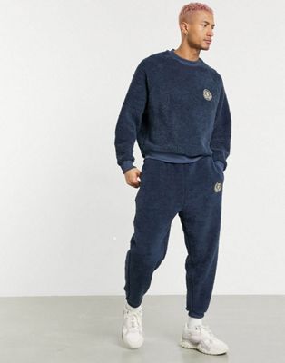 ASOS DESIGN co-ord tracksuit in navy teddy borg with chest embroidery ...