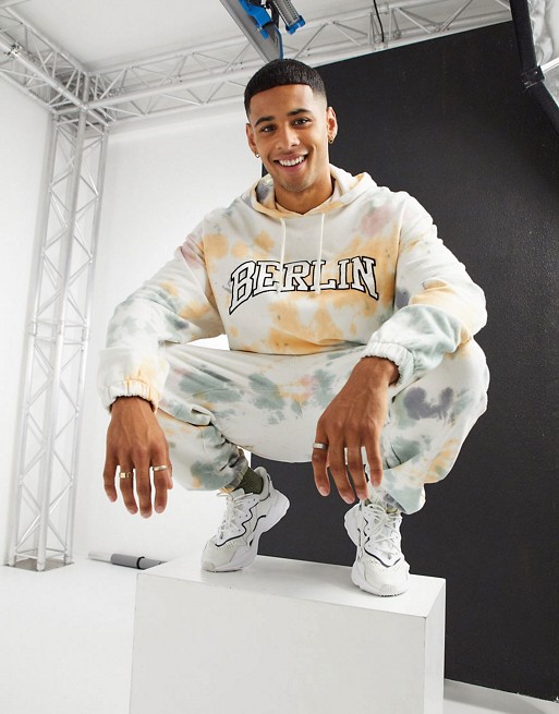 ASOS DESIGN co-ord oversized hoodie in tie dye with Berlin text print