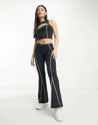 ASOS DESIGN contrast top stitch top and kick flares set in black