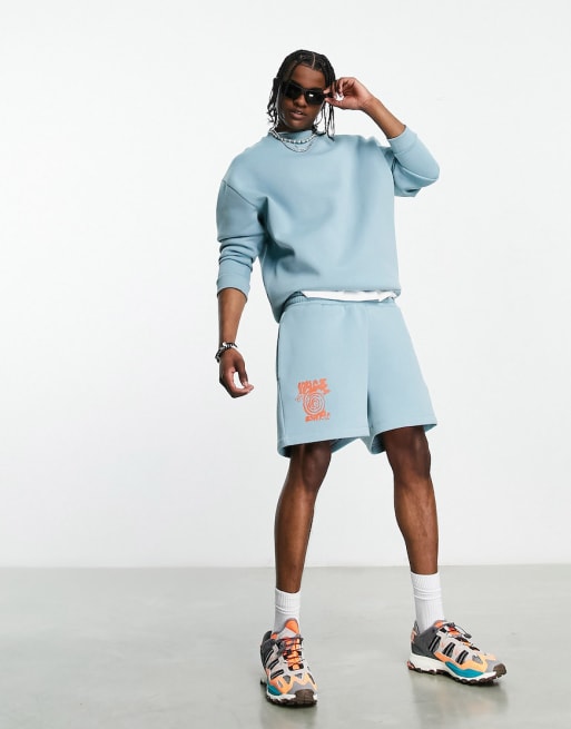 ASOS DESIGN - Coordinato blu con stampa skate sul retro