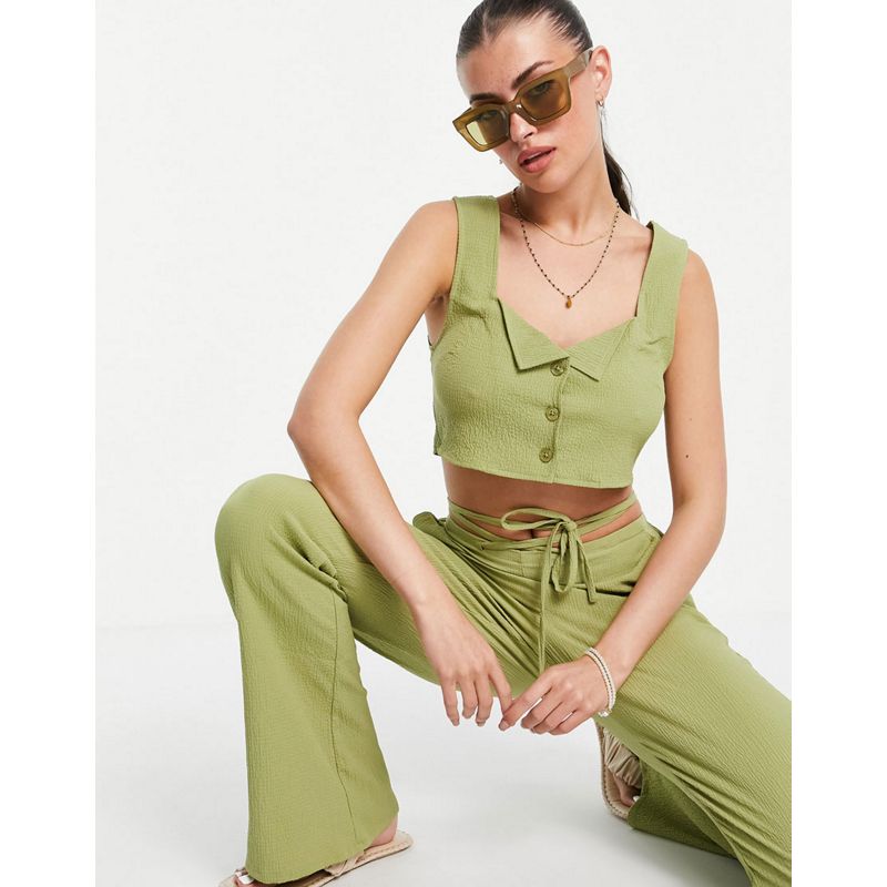 Donna Coordinati DESIGN - Coordinato con crop top e pantaloni a zampa in tessuto stropicciato, colore verde
