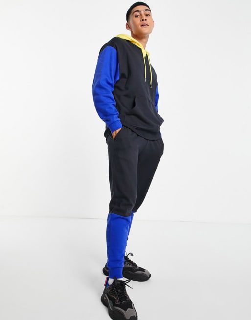 ASOS DESIGN - Coordinato con felpa con cappuccio e joggers oversize color block