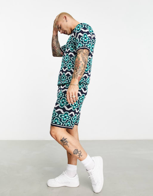 ASOS DESIGN - Coordinato in maglia a fiori con polo con intaglio sul collo e pantaloncini