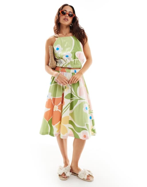 ASOS DESIGN - Gonna svasata e crop top allacciato al collo in cotone a fiori astratti vivaci