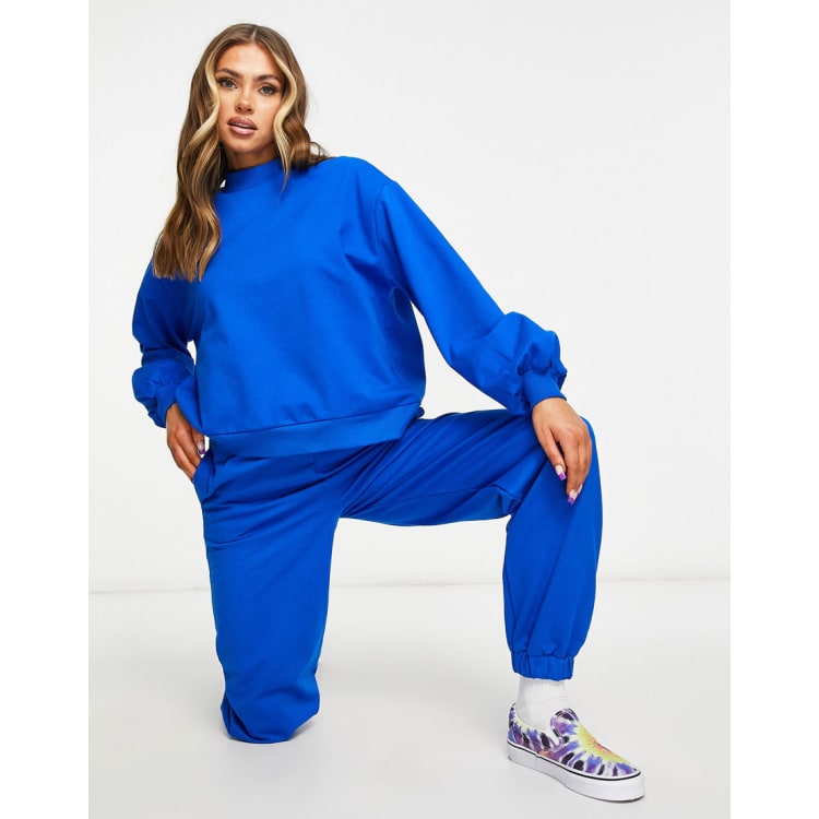 Missguided co-ord oversized jogger with butterfly graphic in blue