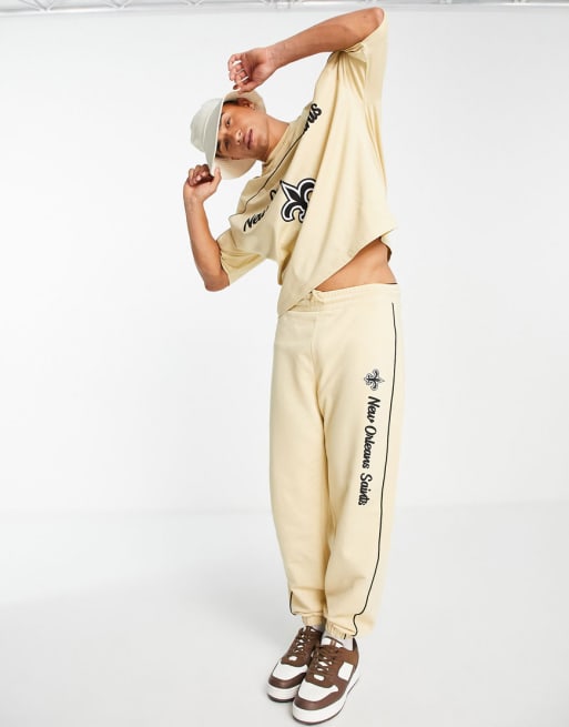 ASOS DESIGN - met 'New Orleans Saints' print in beige