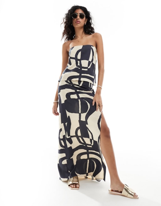 ASOS DESIGN - Minimalistiche bandeautop en midi-rok met gestrikte taille en abstracte print in zwart-wit