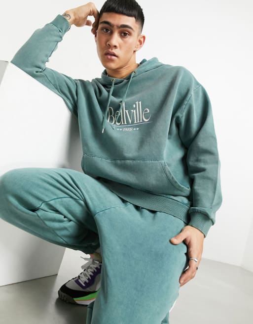 ASOS DESIGN oversized acid wash tracksuit with print in green ASOS