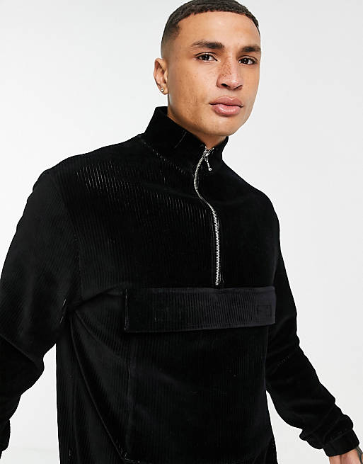 ASOS DESIGN oversized co-ord sweatshirt and joggers in black velour cord