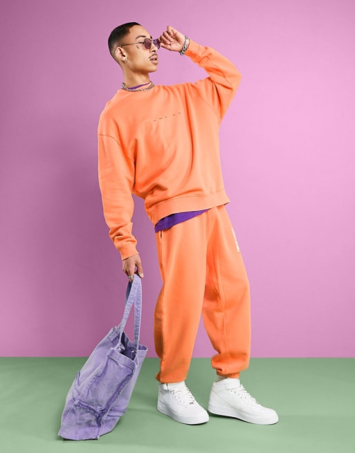 ASOS DESIGN oversized set in bright orange wash with floral graphic back print