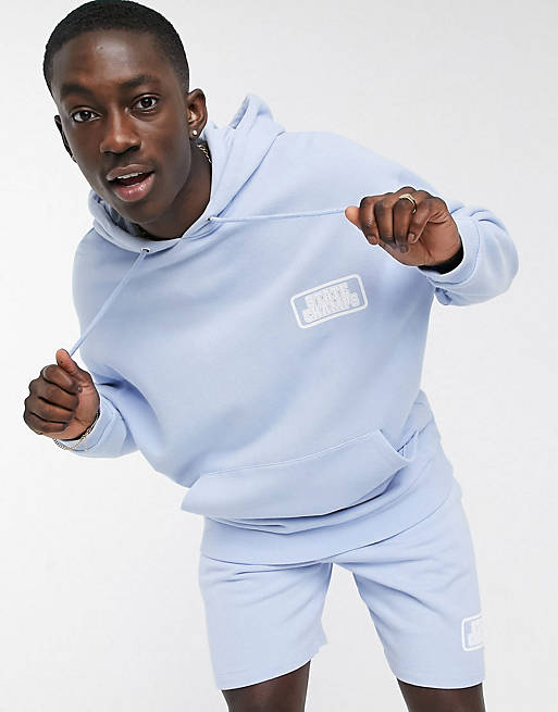 ASOS DESIGN oversized tracksuit shorts with small logo print