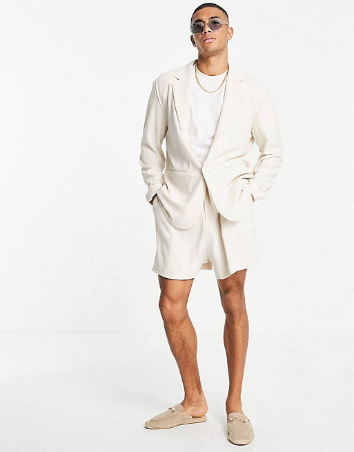 ASOS DESIGN soft tailored pleated wide leg bermuda suit shorts in ecru crepe