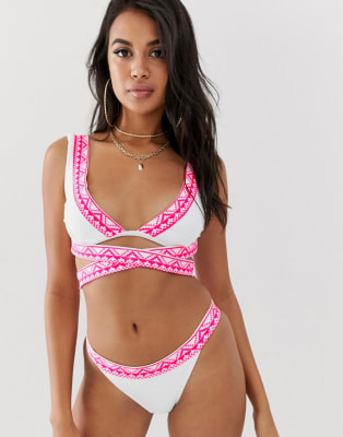 ASOS DESIGN - Top bikini corto a portafoglio con bordi multicolore stampati