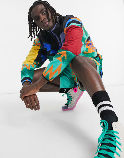 ASOS DESIGN - Trainingspak van fleece met all-over print, combi-set