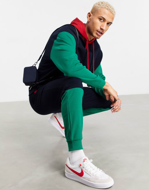 ASOS DESIGN - Tuta sportiva oversize con color block in stile college in coordinato