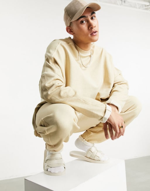 ASOS DESIGN - Tuta sportiva oversize lavaggio a olio, colore beige in coordinato 