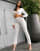 ASOS DESIGN twist detail sweater and wide leg pants two-piece in cream