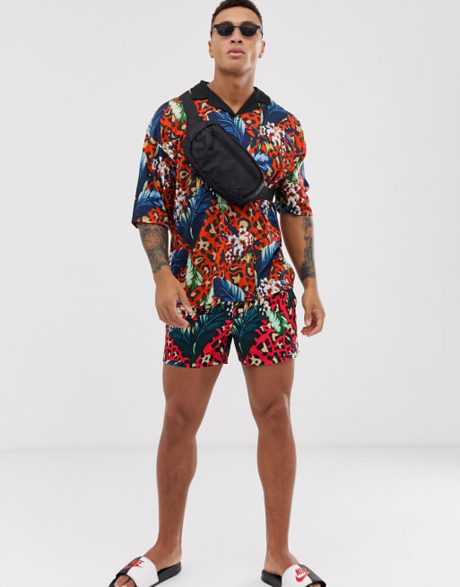 ASOS DESIGN two-piece polo and swim shorts in leopard and floral print