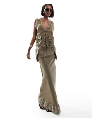 Gebreide gilet met gouden knopen - bordeaux
