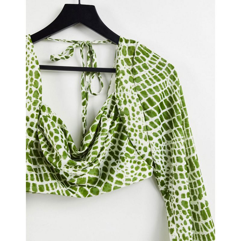 Donna  LUXE - Coordinato con top a maniche lunghe con scollo ad anello e minigonna con intreccio in vita color oliva 