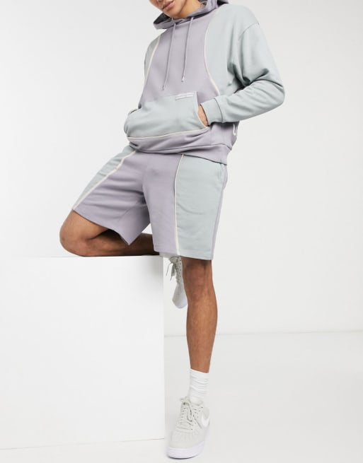 ASOS Unrvlld Supply set with cut and sew details and back print in gray