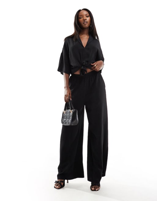 AX Paris - Coordinato nero con camicia allacciata in vita e pantaloni a fondo ampio