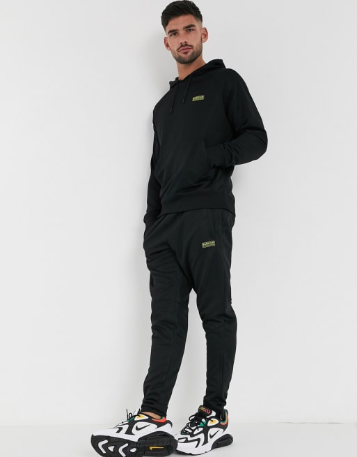 Barbour International tricot tracksuit set in black | ASOS