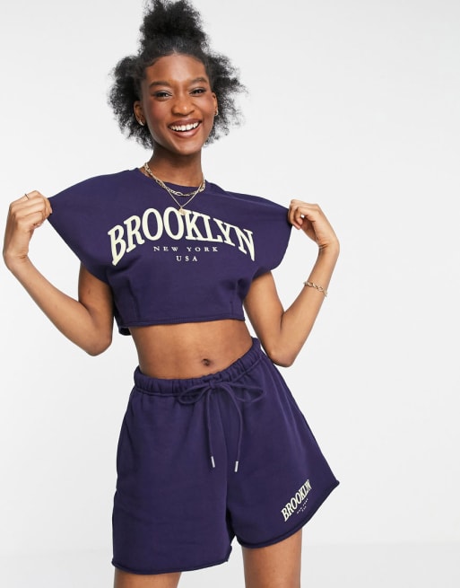 Bershka Brooklyn collegiate cropped sweat and shorts co-ord in navy