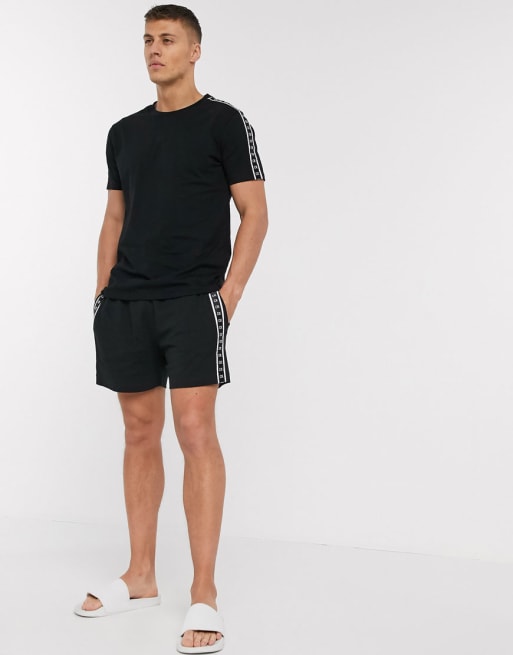  Calvin Klein – Core Mono Tape – Svarta badkläder med logga