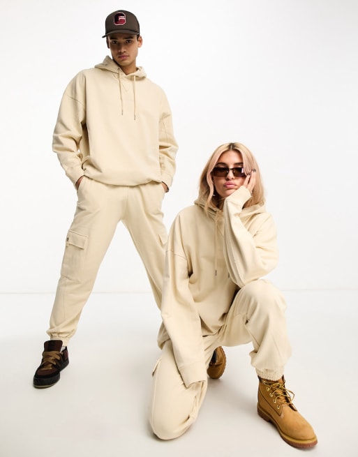 https://images.asos-media.com/groups/calvin-klein-jeans-unisex-seaming-oversized-hoodie-and-sweatpants-set-in-beige-exc/205191026-group-1?$n_640w$&wid=513&fit=constrain