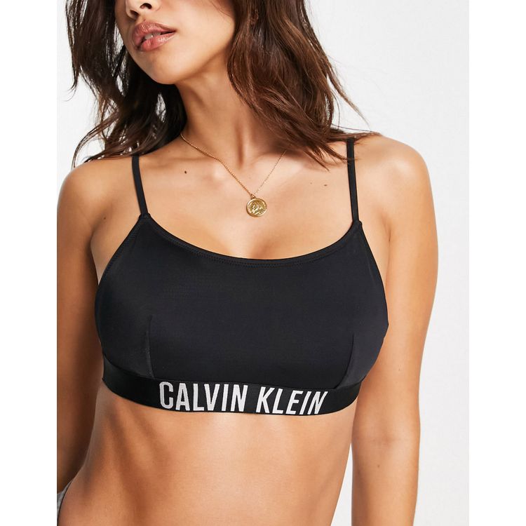 Calvin Klein Performance Modular Strappy Sports Bra in black, ASOS