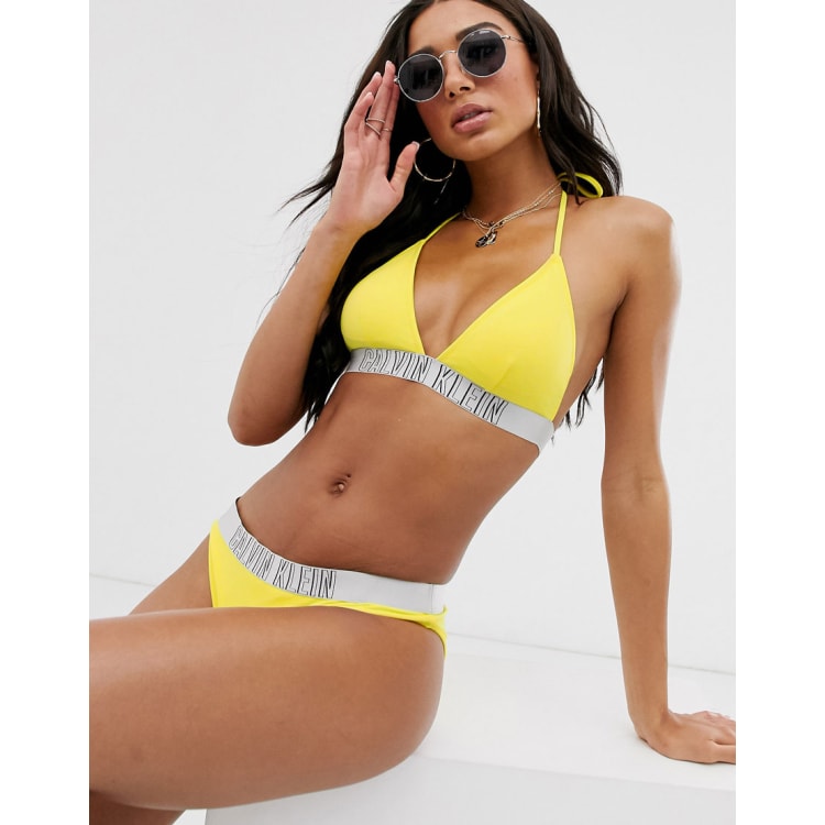 Calvin Klein logo triangle bikini in yellow ASOS