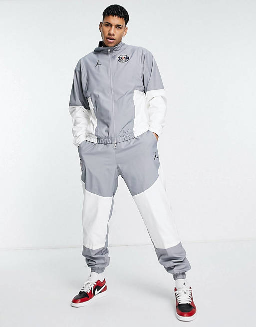 Eliminar interferencia Fructífero Chándal gris y blanco con diseño del Paris Saint-Germain de Nike Jordan |  ASOS