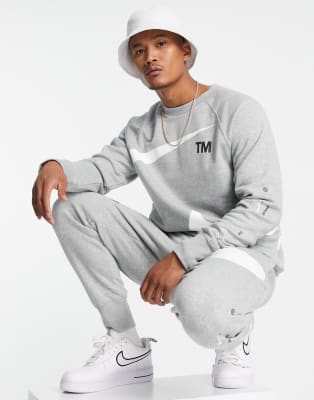 Rugido Noveno Desgracia Chándal gris y blanco con logo de felpa Swoosh de Nike | ASOS