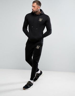 Chándal negro con logo dorado de SikSilk | ASOS