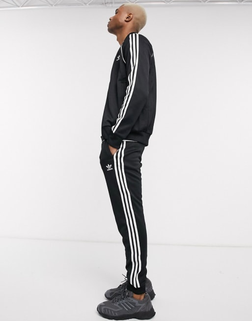 Colgar Farmacología Hombre Chándal negro Superstar de adidas Originals | ASOS