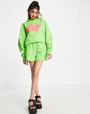 COLLUSION print branded sweat shorts co-ord in green