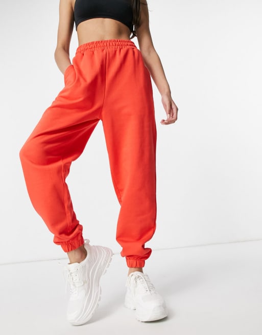 COLLUSION micro bandeau & snap side sweatpants set in red