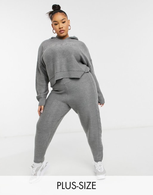 COLLUSION Plus oversized sweatpants with branded bum print in