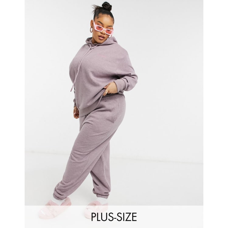 COLLUSION Plus oversized sweatpants with branded bum print in