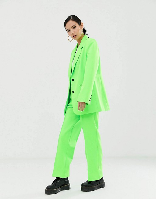 COLLUSION suit in neon green