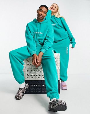 COLLUSION Unisex hoodie & joggers with embroidered logo in green acid wash co-or | ASOS