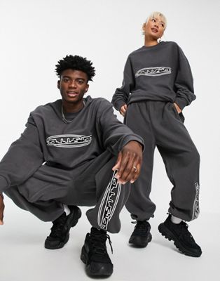 COLLUSION Unisex oversized reverse loopback joggers with embroidery co-ord