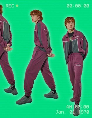 COLLUSION Unisex soft touch tracksuit joggers in plum co-ord