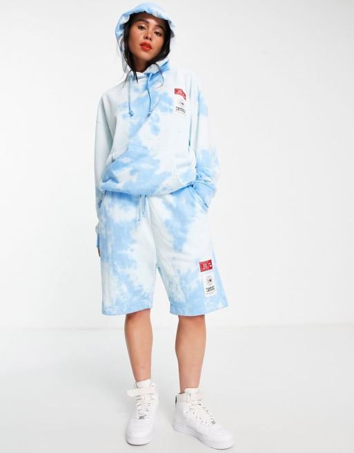 Conjunto azul de pantalones cortos y sudadera con capucha y efecto tie dye de Tommy Jeans