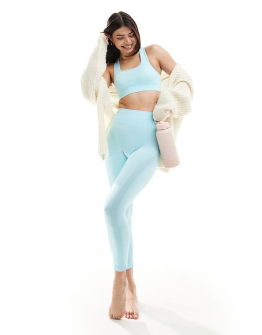 Conjunto azul oscuro de sujetador deportivo y leggings sin costuras Nish de Born Living Yoga